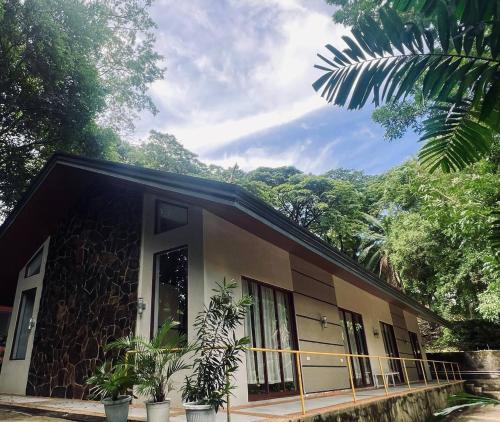 a building with plants in front of it at Momarco Forest Cove in Tanay