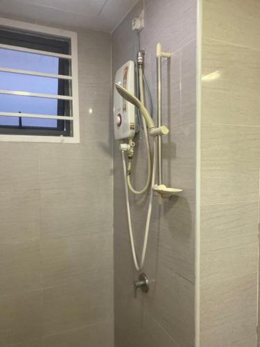 Ванная комната в Vista Alam Roomstay Homestay