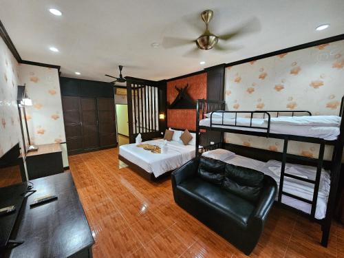 Cama o camas de una habitación en Nanai 2 Residence Patong Phuket