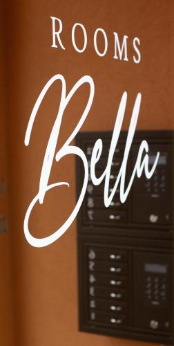 a sign for a room with the word room sittilia at Rooms Bella in Bled