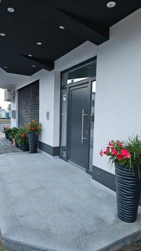 Eine Fassade oder ein Eingang zu Apartmani MURIC Ljubljana