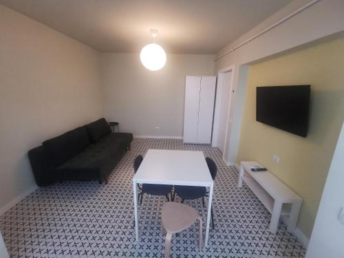 Televisyen dan/atau pusat hiburan di Luxury Apartment Twins