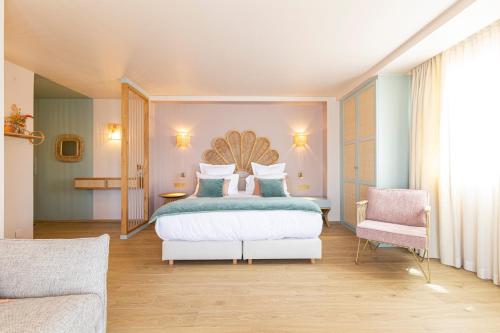 Hotel Riva Beachにあるベッド