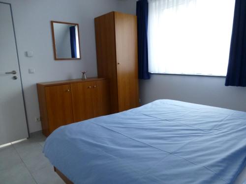 Ένα ή περισσότερα κρεβάτια σε δωμάτιο στο Alter Schulgarten