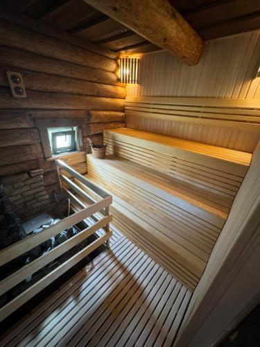 an overhead view of a wooden sauna at Šnekučių kaimas in Miežonys