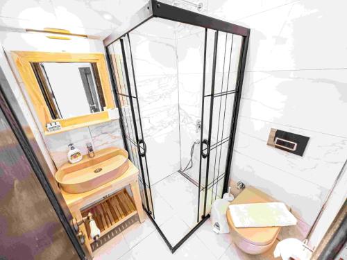 Koupelna v ubytování Bük Butik Otel