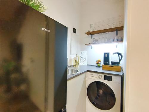 Η κουζίνα ή μικρή κουζίνα στο Design-Apartmenthaus für bis zu 12, modern, Dachterrasse, Grill, ruhige Lage, Disney plus, Wii, LAN und WLAN