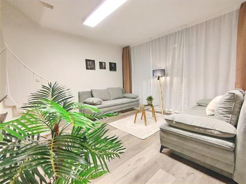 Χώρος καθιστικού στο Design-Apartmenthaus für bis zu 12, modern, Dachterrasse, Grill, ruhige Lage, Disney plus, Wii, LAN und WLAN
