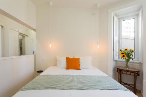 Letto o letti in una camera di Vila Julieta Guesthouse