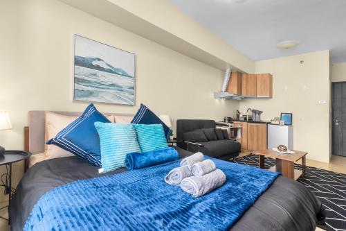 Ένα ή περισσότερα κρεβάτια σε δωμάτιο στο Skyline Studio at Avida Riala In Cebu IT Park