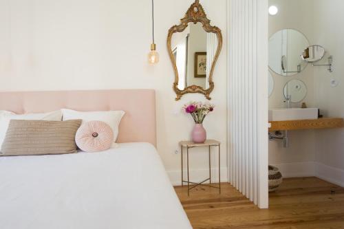 Letto o letti in una camera di Vila Julieta Guesthouse