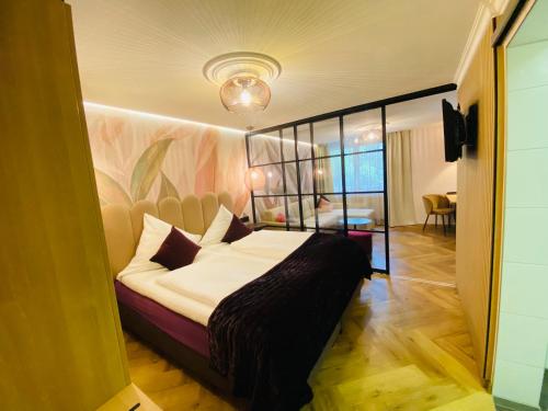 Postel nebo postele na pokoji v ubytování Boutique - Hotel Zum Schloss
