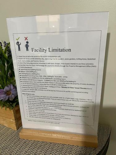 a sign for a facility limitation on a table at MaRoy Suites at Asteria Residences (Near NAIA with free Parking+Fiber Internet) in Manila