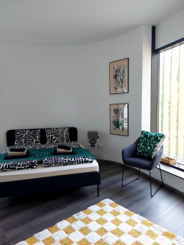 Posteľ alebo postele v izbe v ubytovaní Apartman a Kékszalag sétányon