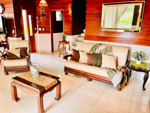 Khu vực ghế ngồi tại Casa Victoriana Aeropuerto