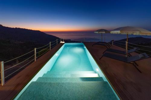 a swimming pool on the deck of a cruise ship at Villa Ruya Cefalù in Cefalù