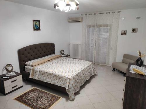 Postel nebo postele na pokoji v ubytování Casa Vacanza 6 posti letto - Grazia Home