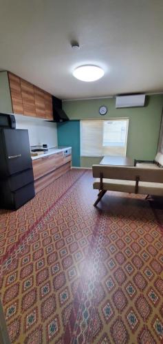 Kuchyň nebo kuchyňský kout v ubytování Midtown Inn
