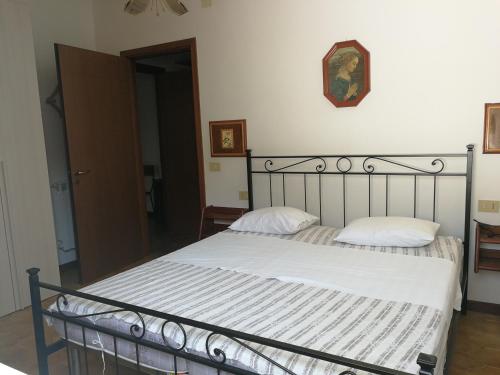 En eller flere senge i et værelse på Casa Valentina ANIMALI NON AMMESSI