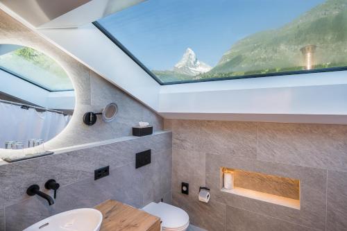 Koupelna v ubytování Hotel Bella Vista Zermatt