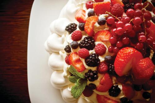 a plate of fruit salad on a table at Soar Mill Cove Hotel in Soar