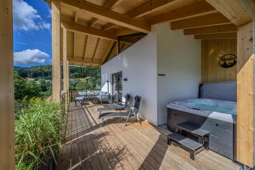 Chalets Woid_Liebe&Glückにあるバルコニーまたはテラス