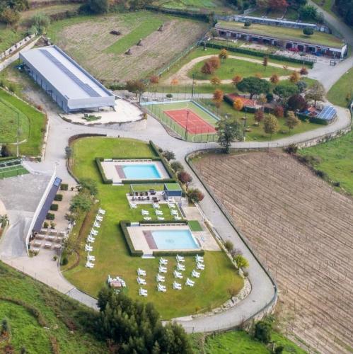 an aerial view of a park with a tennis court at Vale de Rans - Country House in Rans
