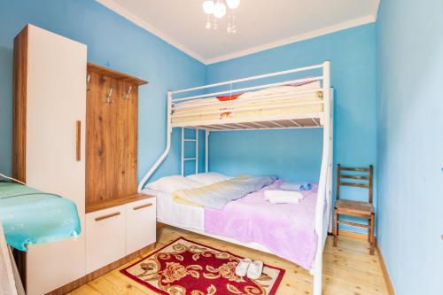 Voodi või voodid majutusasutuse Giorgi's Home toas