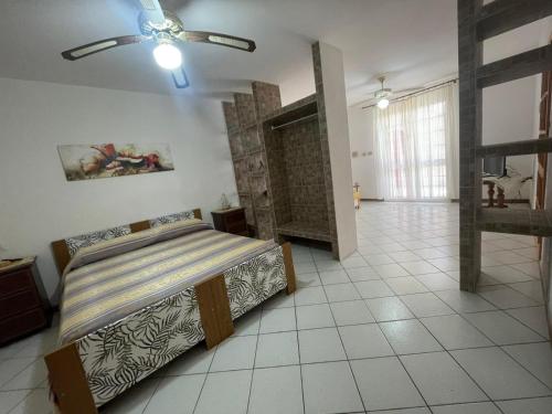 Postel nebo postele na pokoji v ubytování Villa Muntiranni