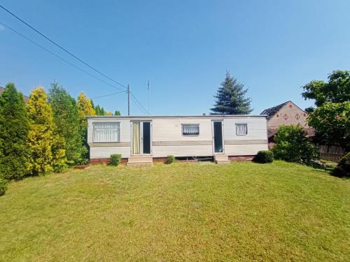 Wakacje nad jeziorem w Chłopowie - Domek