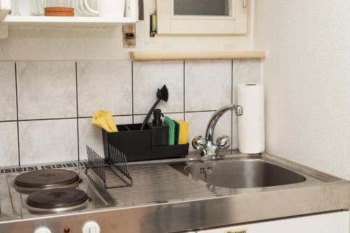Dapur atau dapur kecil di Citycenter Apartment with Parking
