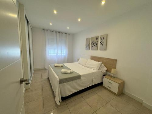 Ένα ή περισσότερα κρεβάτια σε δωμάτιο στο La Maison d'Elisabet