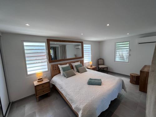 Una cama o camas en una habitación de Villa Pandora