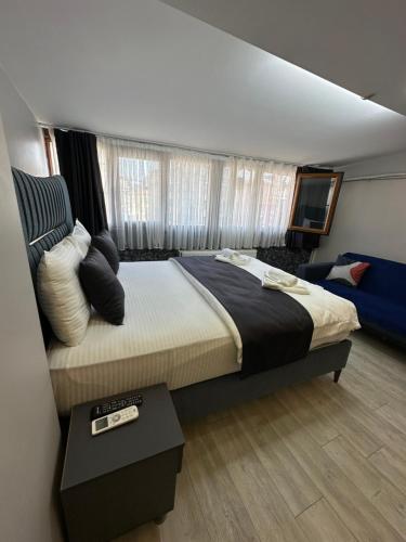 a bedroom with a large bed in a room at The Square 30 in Istanbul