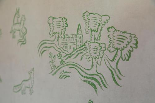 a drawing of flowers on the side of a wall at Georgian House Hotel in Whitehaven