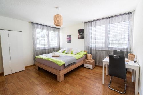 Una cama o camas en una habitación de Cozy Studio Einigen