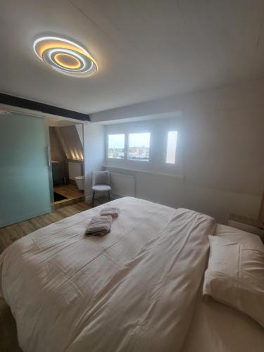 Ένα ή περισσότερα κρεβάτια σε δωμάτιο στο Rode Huis