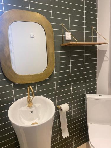 Koupelna v ubytování Bel appartement en plein cœur de Carpentras