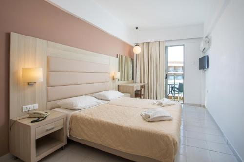 Postel nebo postele na pokoji v ubytování Hotel Africa