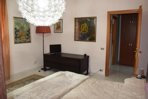 Ένα ή περισσότερα κρεβάτια σε δωμάτιο στο Villa Mimosa