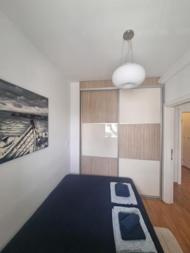 Postel nebo postele na pokoji v ubytování Laguna