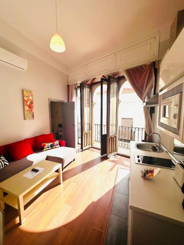 Μια τηλεόραση ή/και κέντρο ψυχαγωγίας στο Apartamentos Templo Diana -Vistas Históricas-