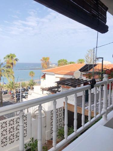 a balcony of a house with a view of the ocean at Casa Alejandro Las Vistas in Arona