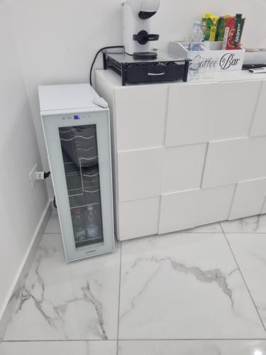 Kuchyň nebo kuchyňský kout v ubytování Serenity Suite
