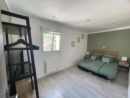 Ένα ή περισσότερα κρεβάτια σε δωμάτιο στο Maison Wallers 500m des mines