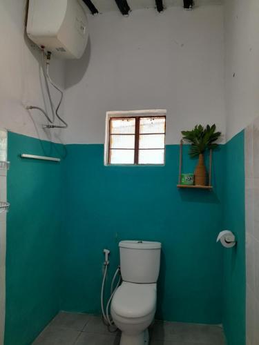 Koupelna v ubytování Nyumbani Hostel