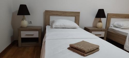 Postel nebo postele na pokoji v ubytování Tamaris apartments