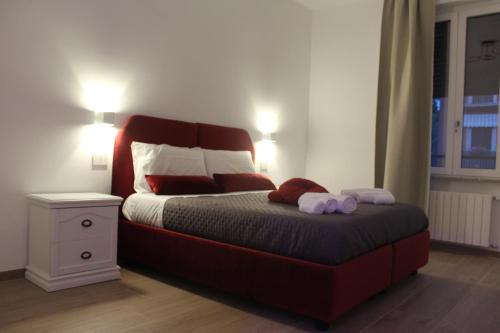 a bedroom with a large bed with two pillows at Blue Home in Pero