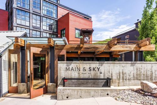 a building with a sign that reads main and sky at Main & SKY by EXMAR in Park City