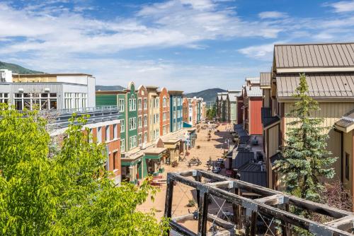 a view of a city street with colorful buildings at Main & SKY by EXMAR in Park City